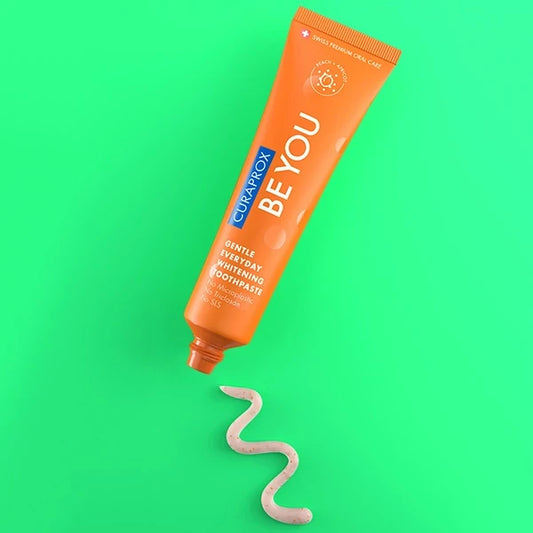 Відбілююча зубна паста Curaprox Be You Orange зі смаком персика та абрикоса (60 мл.)