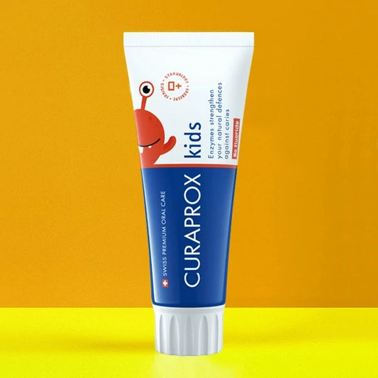 Дитяча зубна паста Curaprox Kids зі смаком полуниці (60 мл.)
